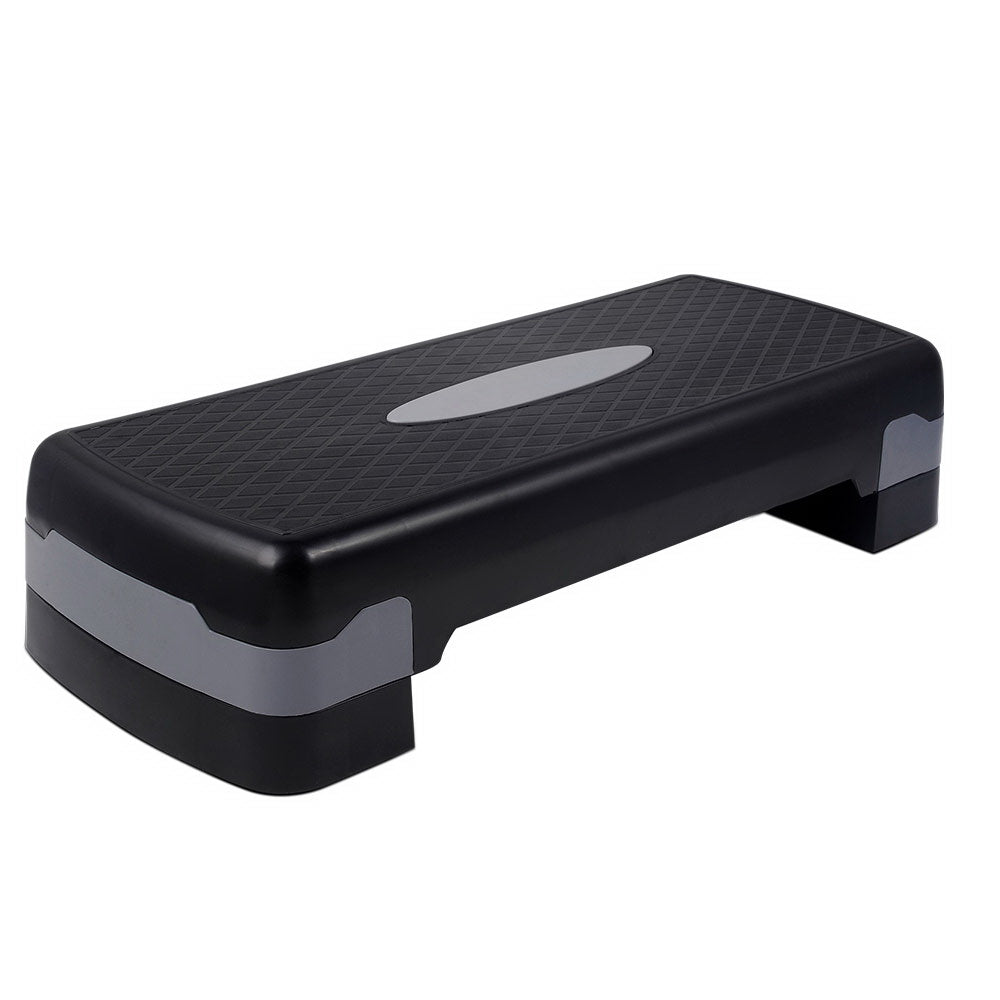 Black and grey Everfit aerobic step with a textured top and riser supports